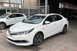 Toyota Corolla: 2019 г., 1.8 л, Гибрид, Седан